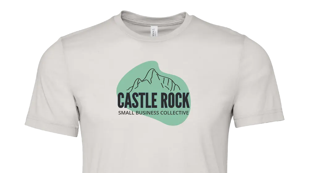 Castle Rock Small Business Collective logo printed on a light grey tee